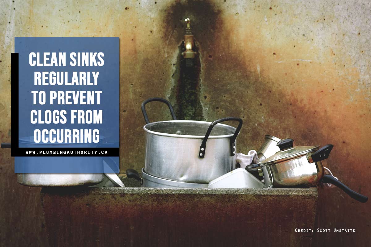 Clean sinks regularly to prevent clogs from occurring