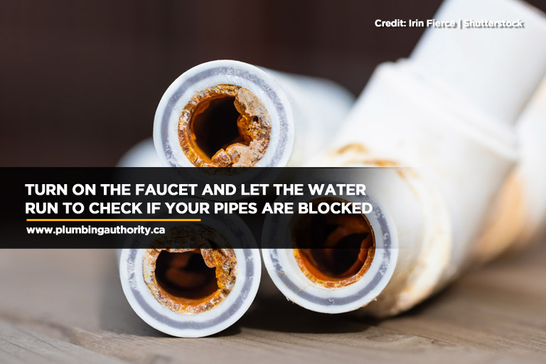 Turn on the faucet and let the water run to check if your pipes are blocked