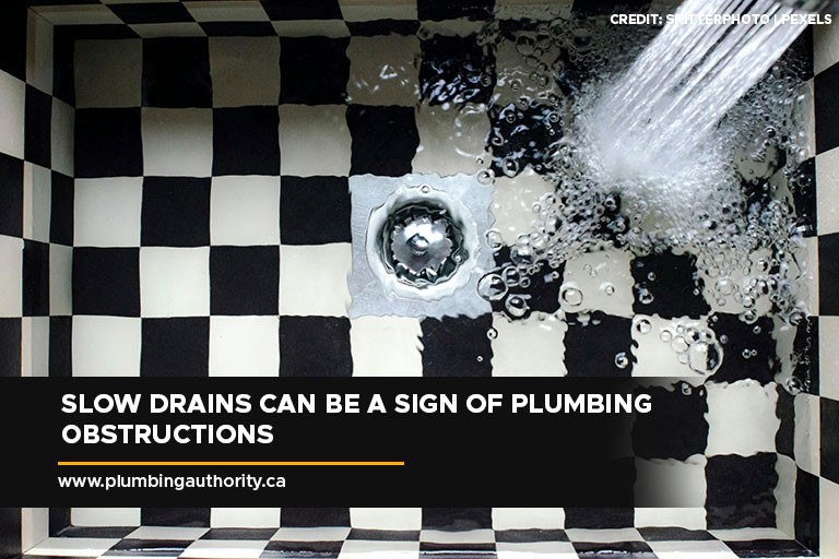 Slow drains can be a sign of plumbing obstructions